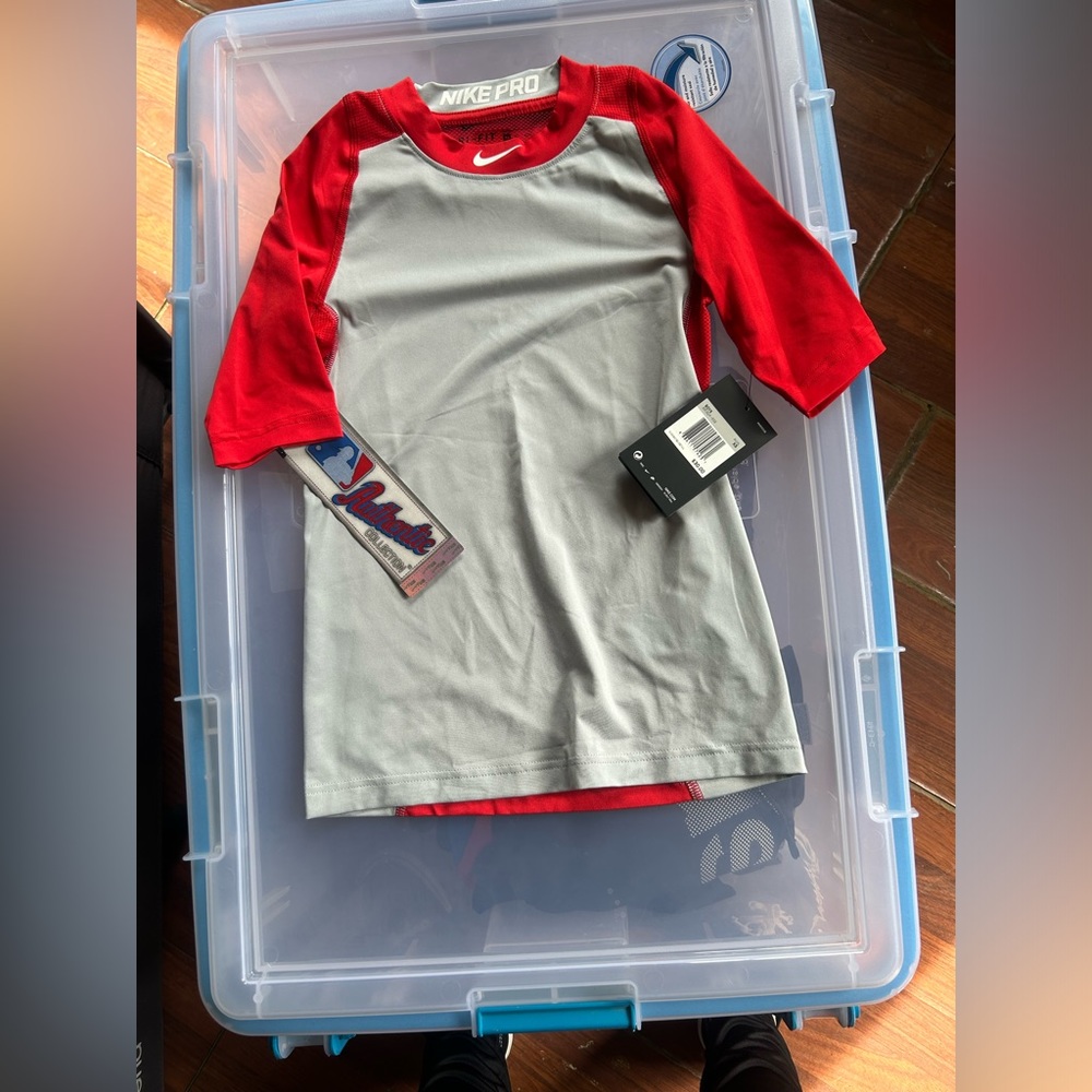 Two Nike Pro long sleeves